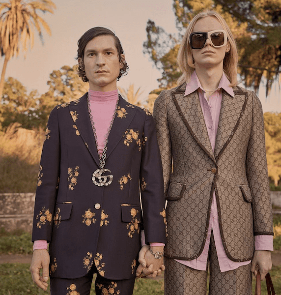Gucci models wear a floral jacquard suit and a GG wool jacket.