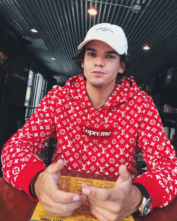 Jake Charnes wears his Supreme x Louis Vuitton hoodie Photo credit: Jake Charnes