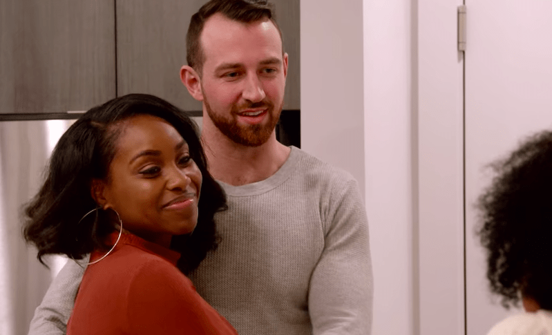 Hamilton embraces Speed as they meet her parents.