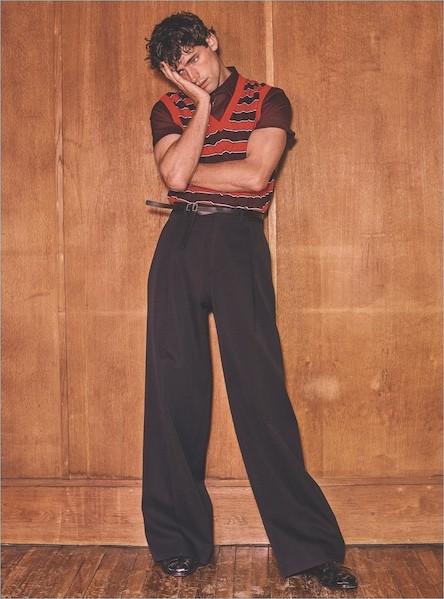 Sean O'Pry covered Les Echos in this retro look featuring a tucked-in sweater vest and a polo underneath.