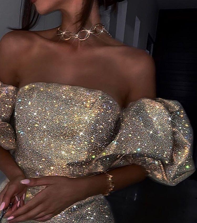 Gold dress perfect for an elegant evening on Bourbon Street. Photo credit: Pinterest